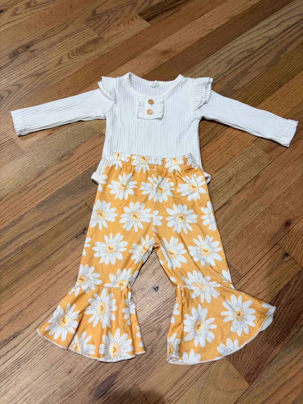 Baby girl white long sleeve onesie with floral gold bell bottom pants outfit